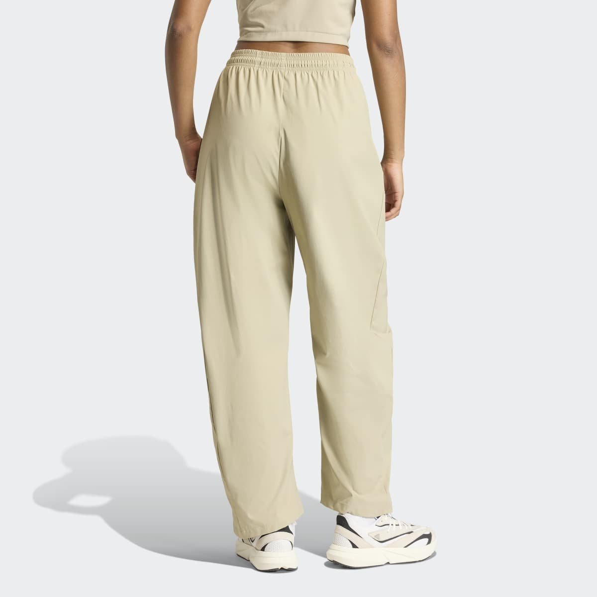 Calça Adidas Z.N.E Woven Feminina - 1