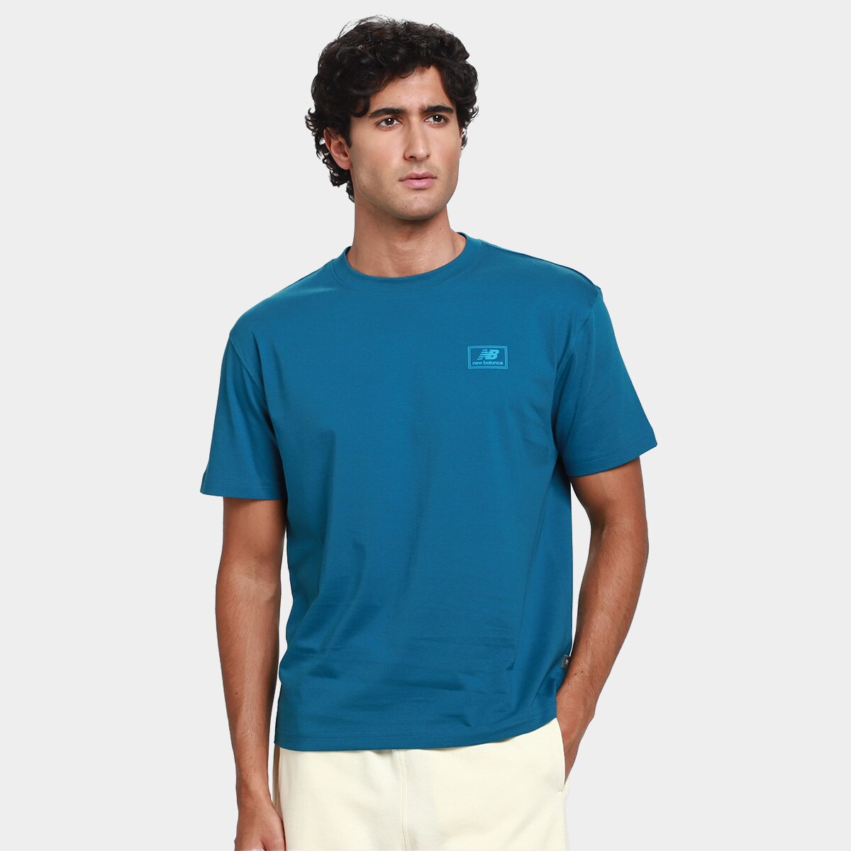 Camiseta New Balance Woven Label Masculina - Azul Petróleo | Netshoes
