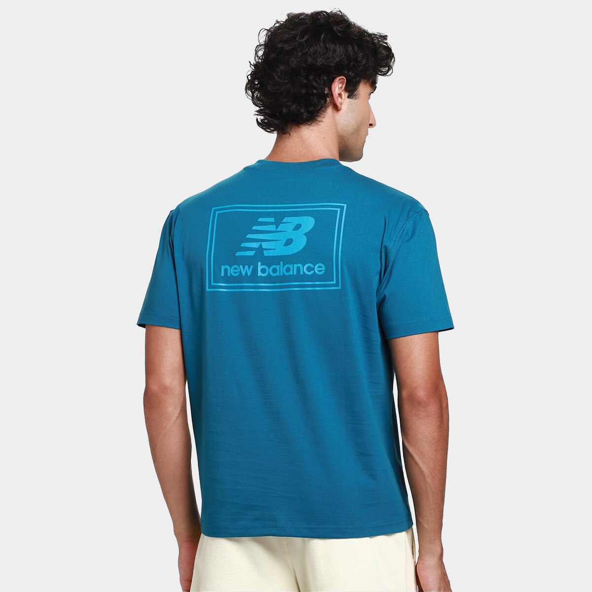 Camiseta New Balance Woven Label Masculina - Azul Petróleo | Netshoes
