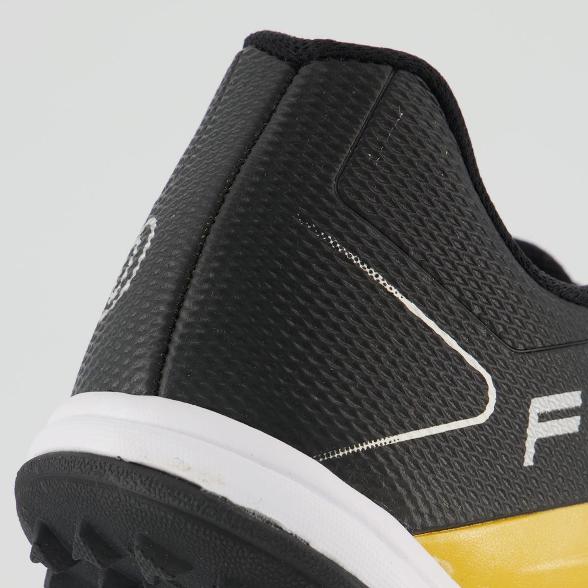 Chuteira Umbro Fifty VII Society Dourada e Preta - Dourado | Netshoes